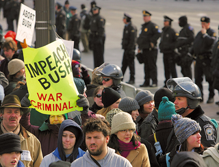 Some of the 24,999 protesters who showed up to turn their backs on Bush.